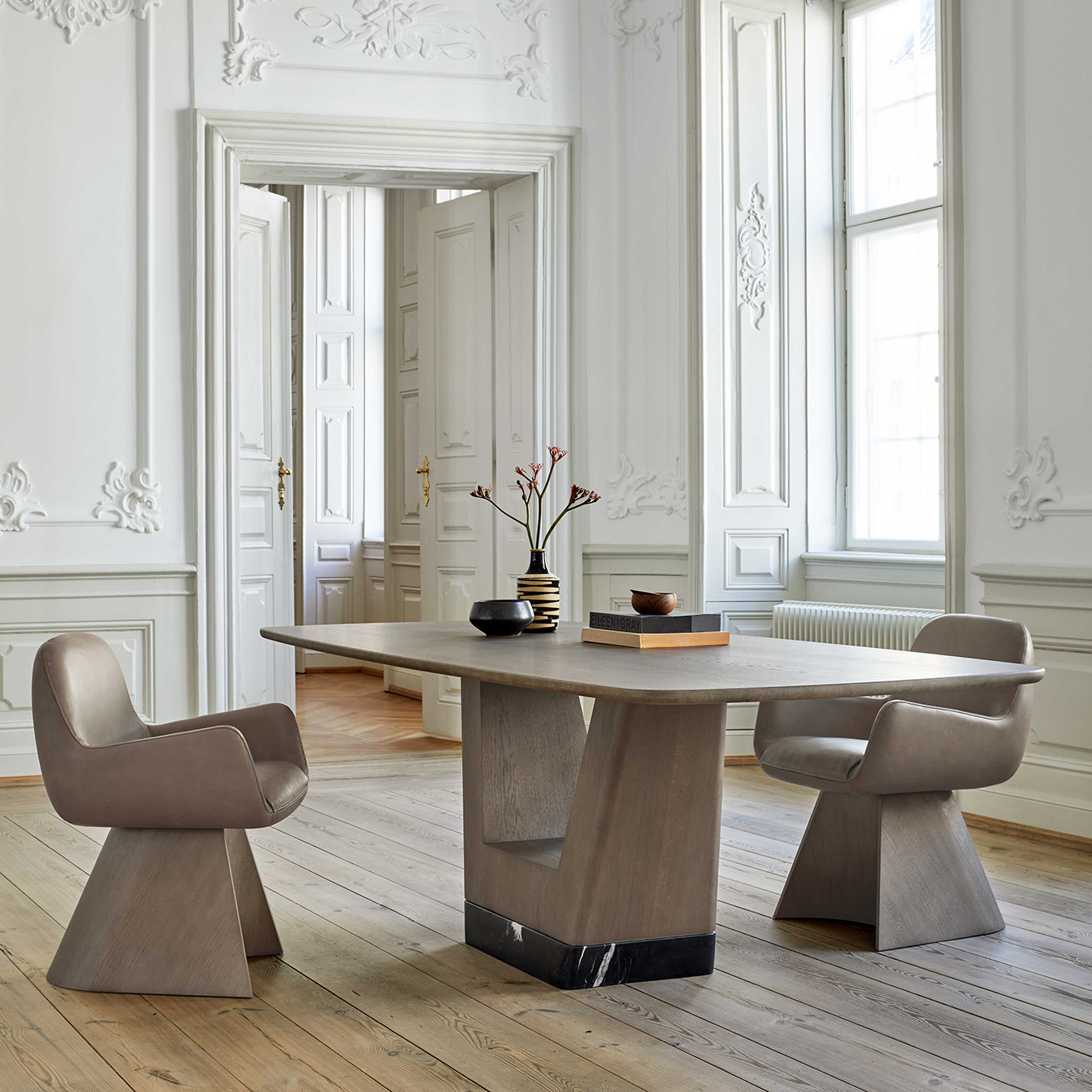 Contemporary dinning table in a classic home architecture